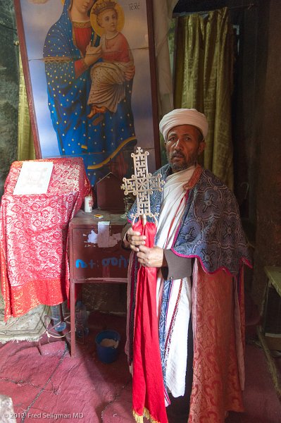 20120402_154538 Nikon D3S 2x3.jpg - Priest in underground church